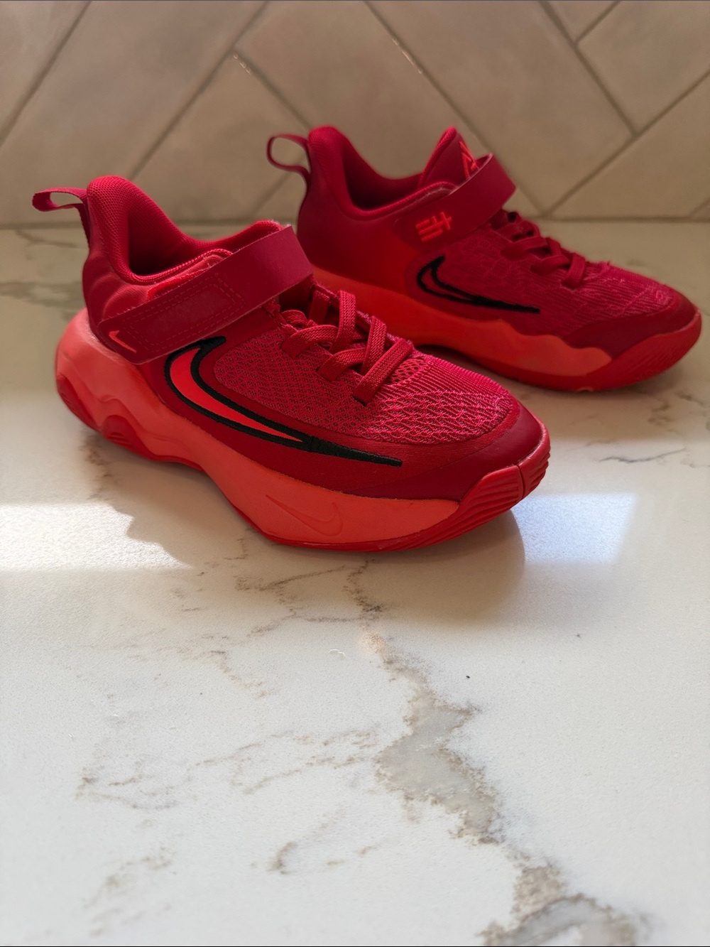 Nike Youth Red Athletic Sneakers with Black Swoosh